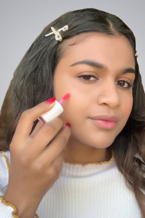 Dot onto cheeks & blend in quickly.